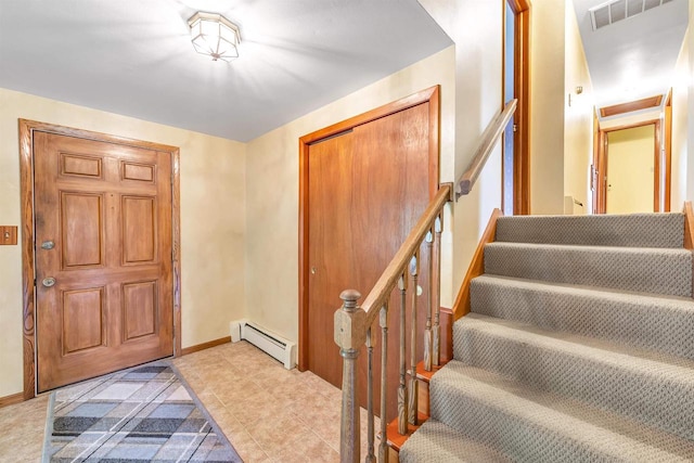 2044 E Vista Cir, De Pere, WI 54115 - foyer entrance featuring baseboard heating, stairway, light tile patterned floors, and baseboards