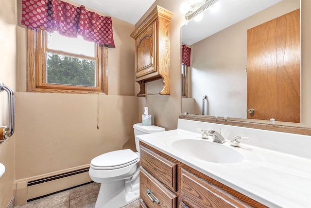 2044 E Vista Cir, De Pere, WI 54115 - bathroom with a baseboard radiator, toilet, vanity, and tile patterned flooring