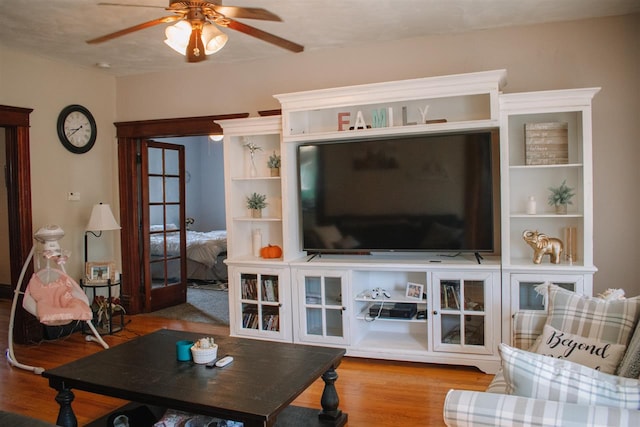 202 Wisconsin St, Mauston, WI 53948 - living area featuring wood finished floors and a ceiling fan