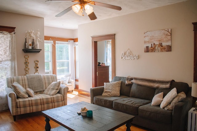 202 Wisconsin St, Mauston, WI 53948 - living area featuring a ceiling fan and wood finished floors