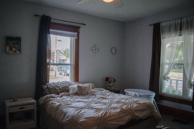 202 Wisconsin St, Mauston, WI 53948 - bedroom with ceiling fan and carpet