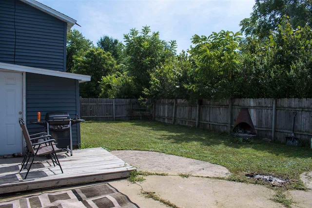 202 Wisconsin St, Mauston, WI 53948 - view of yard featuring a wooden deck and a patio
