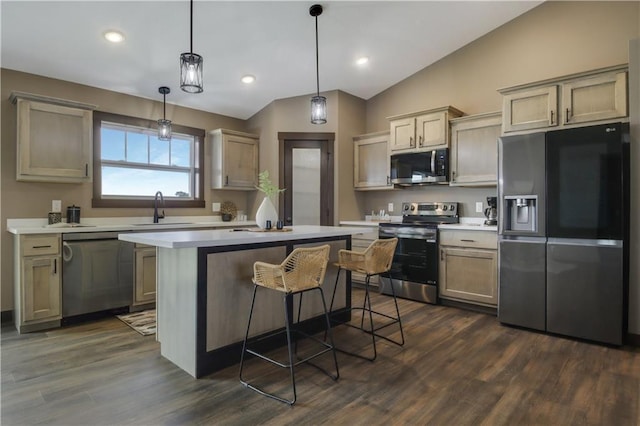 3557 114th St, Chippewa Falls, WI 54729 - kitchen with stainless steel appliances, a sink, lofted ceiling, a center island, and light countertops