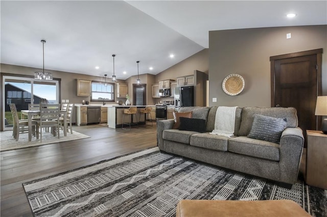 3557 114th St, Chippewa Falls, WI 54729 - living room featuring wood finished floors, lofted ceiling, and recessed lighting