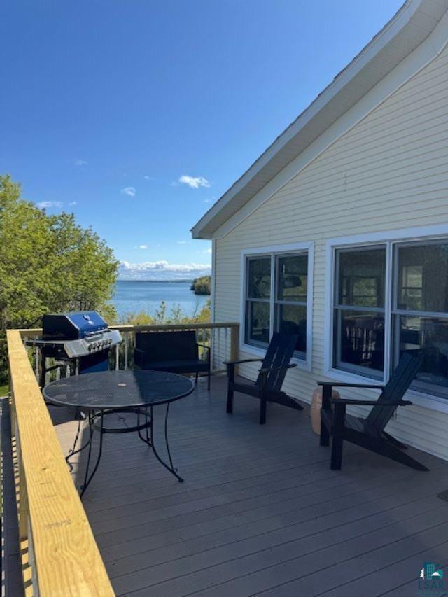 240 6th St S, Bayfield, WI 54814 - wooden deck featuring a water view and outdoor dining area