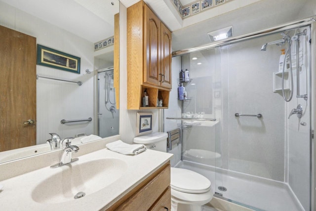 5748 Cambridge Ln Unit 3, Mount Pleasant, WI 53406 - full bathroom with toilet, a stall shower, and vanity