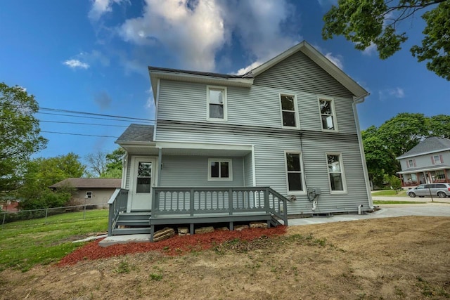 217 E Division St, Dodgeville, WI 53533 - view of front facade with a deck