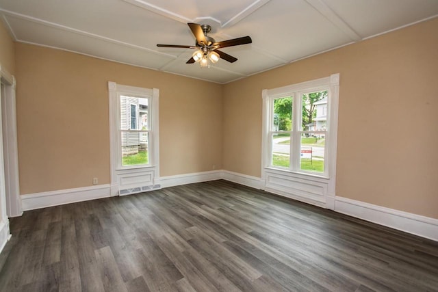 217 E Division St, Dodgeville, WI 53533 - spare room featuring dark wood-style flooring, a ceiling fan, and baseboards