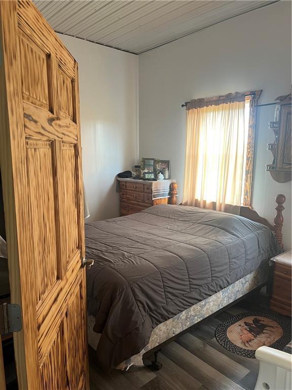 14518 State Highway 73, Lublin, WI 54447 - bedroom featuring wood finished floors