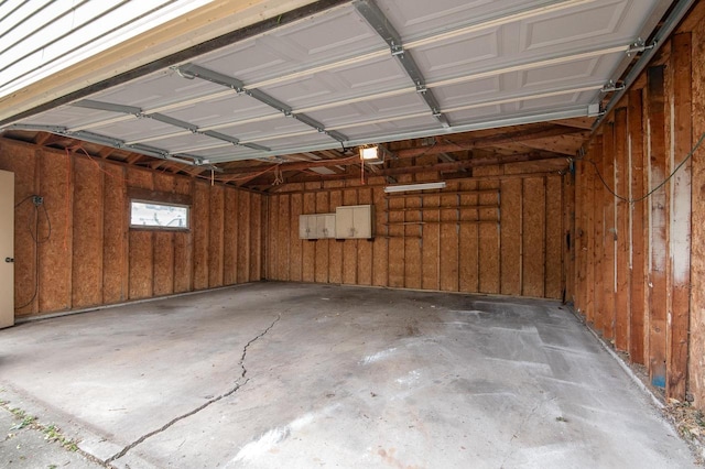 745 Carver Ln, Menasha, WI 54952 - garage featuring a garage door opener and electric panel