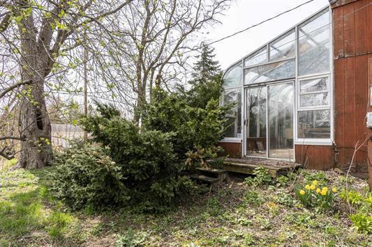 2608 County Road T, Sun Prairie, WI 53590 - view of yard with a sunroom
