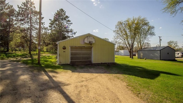 207 State Rd 25, Wheeler, WI 54772 - detached garage with driveway