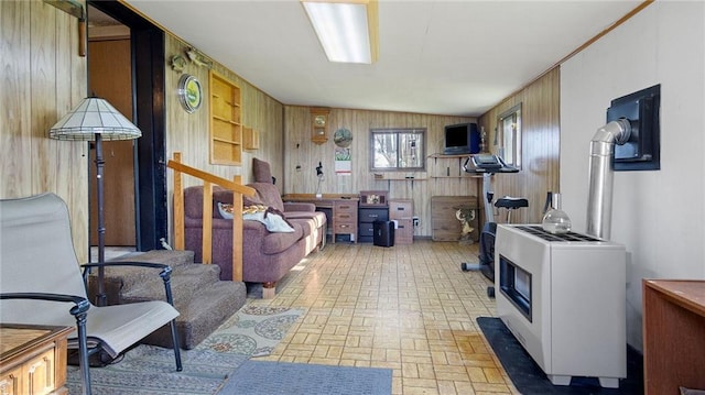 207 State Rd 25, Wheeler, WI 54772 - living room with brick patterned flooring and wood walls