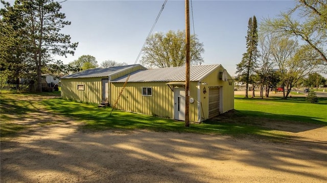207 State Rd 25, Wheeler, WI 54772 - view of outdoor structure featuring dirt driveway
