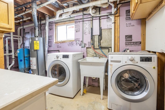 11934 187th Ave, Bristol, WI 53104 - laundry room featuring cabinet space, gas water heater, and washer and clothes dryer