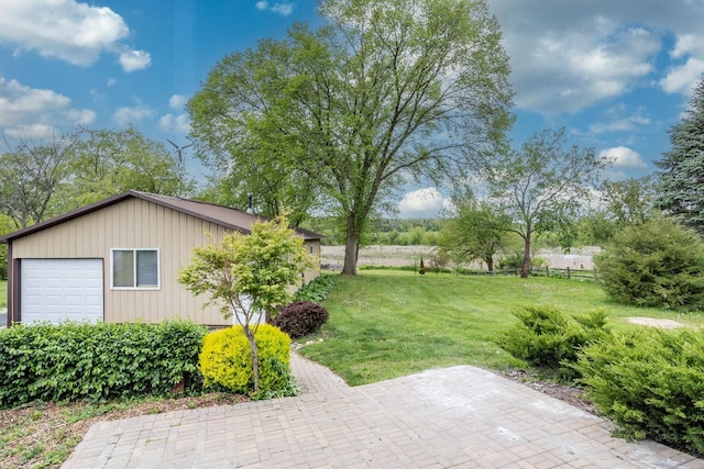 11934 187th Ave, Bristol, WI 53104 - view of grassy yard with a garage