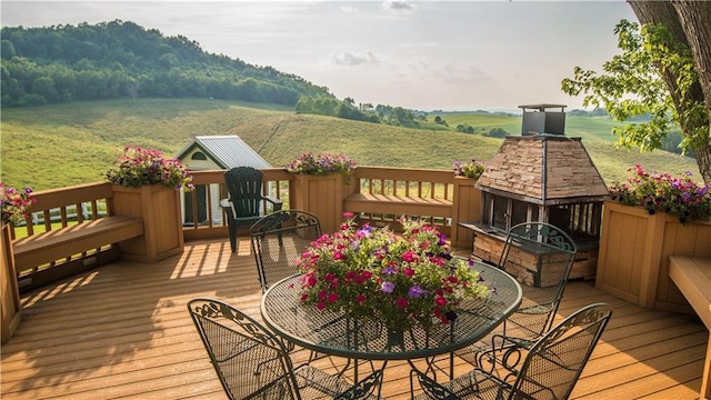 S523 Cole Rd, Mondovi, WI 54755 - wooden terrace featuring a view of countryside and outdoor dining space