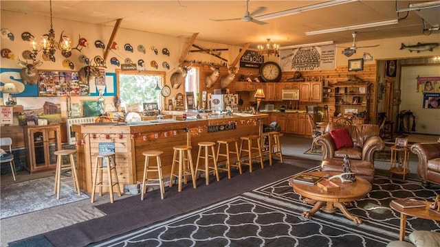 S523 Cole Rd, Mondovi, WI 54755 - carpeted living room with a chandelier and ceiling fan
