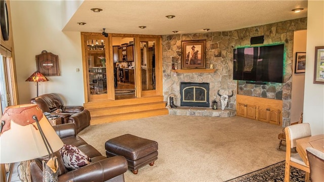 S523 Cole Rd, Mondovi, WI 54755 - carpeted living area featuring a stone fireplace