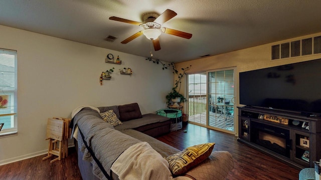 619 Reena Ave Unit 8, Fort Atkinson, WI 53538 - living area featuring a ceiling fan, wood finished floors, and baseboards