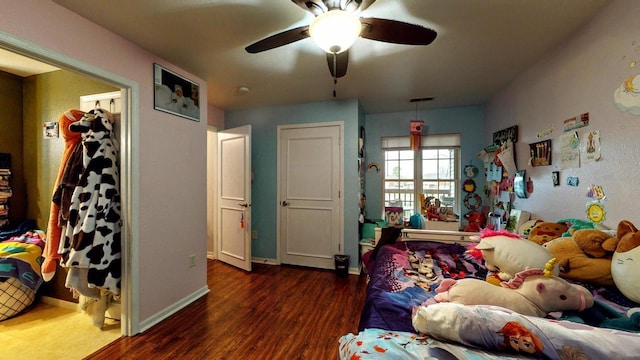 619 Reena Ave Unit 8, Fort Atkinson, WI 53538 - bedroom with wood finished floors, baseboards, and ceiling fan