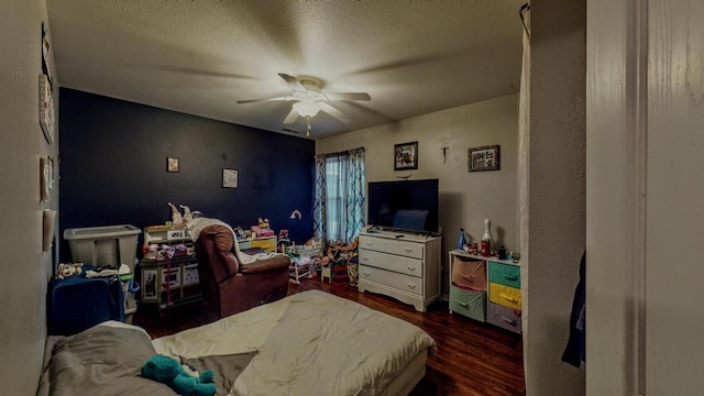 619 Reena Ave Unit 8, Fort Atkinson, WI 53538 - bedroom featuring wood finished floors, a ceiling fan, and a textured ceiling