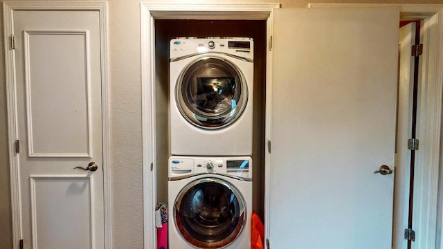619 Reena Ave Unit 8, Fort Atkinson, WI 53538 - laundry area with stacked washer / drying machine