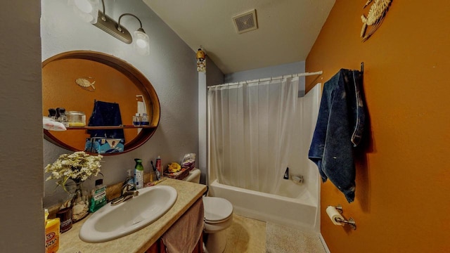 619 Reena Ave Unit 8, Fort Atkinson, WI 53538 - bathroom featuring toilet, vanity, and shower / tub combo