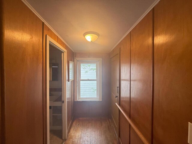 312 W 4th St, Marshfield, WI 54449 - hall featuring crown molding and wood-type flooring