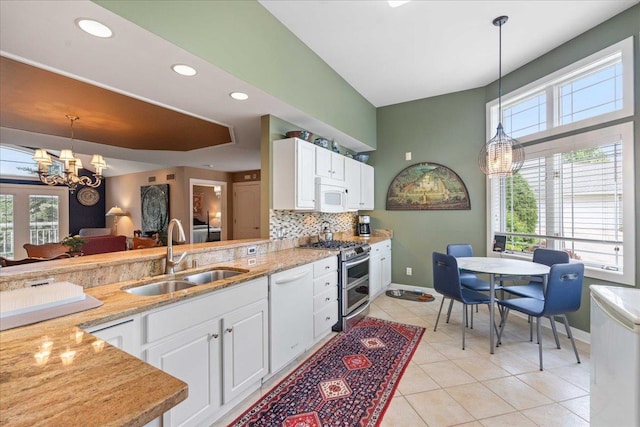 1814 Masters Ln, Madison, WI 53719 - kitchen featuring a sink, white appliances, backsplash, baseboards, and white cabinetry