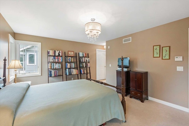 1814 Masters Ln, Madison, WI 53719 - bedroom with a chandelier, light carpet, and baseboards