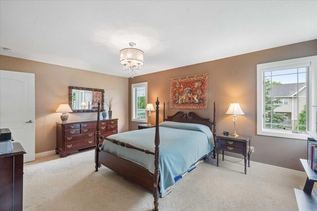 1814 Masters Ln, Madison, WI 53719 - bedroom featuring carpet floors and a chandelier