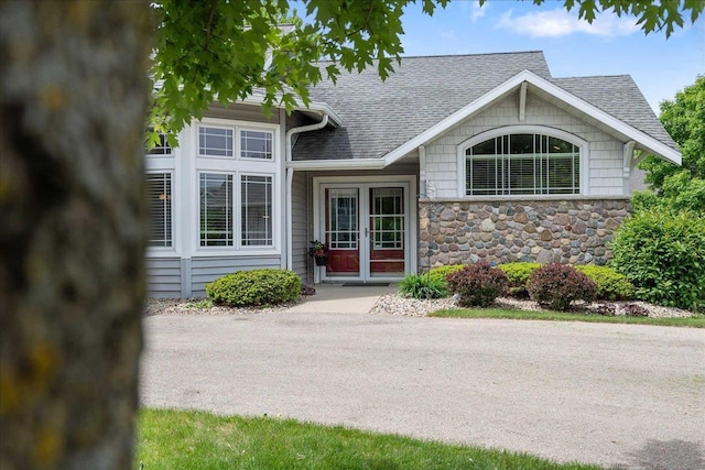 1814 Masters Ln, Madison, WI 53719 - view of front of property featuring roof with shingles and stone siding