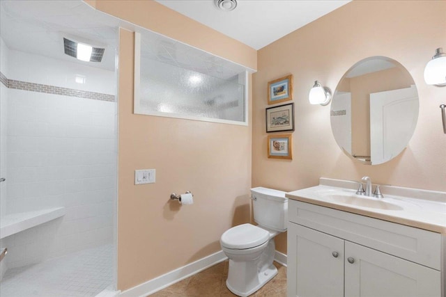 1814 Masters Ln, Madison, WI 53719 - bathroom featuring toilet, a tile shower, tile patterned flooring, vanity, and baseboards