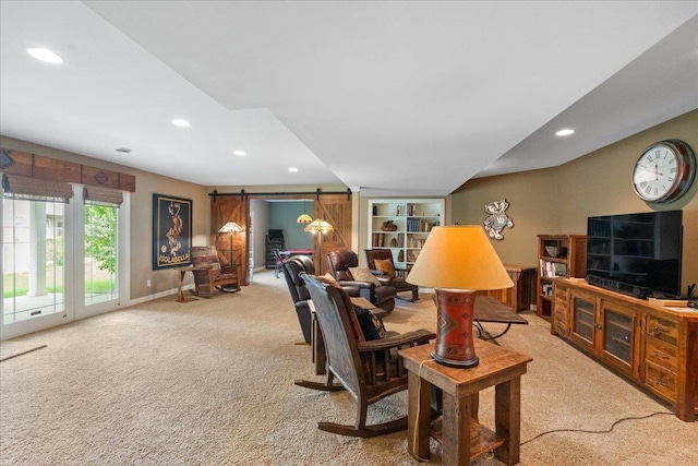 1814 Masters Ln, Madison, WI 53719 - living area featuring light carpet, a barn door, recessed lighting, and baseboards