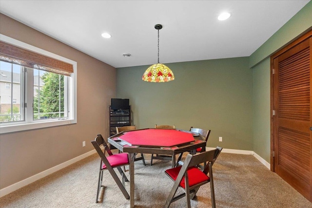 1814 Masters Ln, Madison, WI 53719 - dining area featuring light colored carpet, baseboards, and recessed lighting
