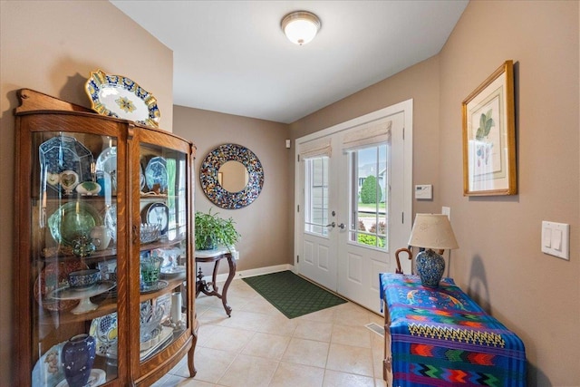 1814 Masters Ln, Madison, WI 53719 - foyer featuring light tile patterned flooring and baseboards