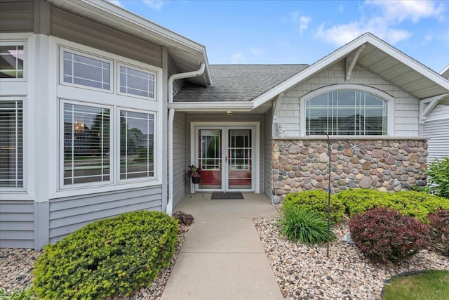 1814 Masters Ln, Madison, WI 53719 - entrance to property with roof with shingles, stone siding, and french doors