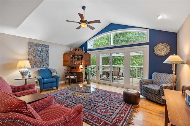 1814 Masters Ln, Madison, WI 53719 - living room featuring a ceiling fan, wood finished floors, and high vaulted ceiling