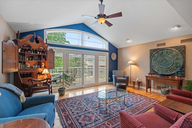 1814 Masters Ln, Madison, WI 53719 - living room featuring a ceiling fan, wood finished floors, and high vaulted ceiling