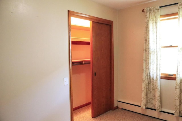 1007 Franklin St, Sauk City, WI 53583 - closet featuring a baseboard radiator