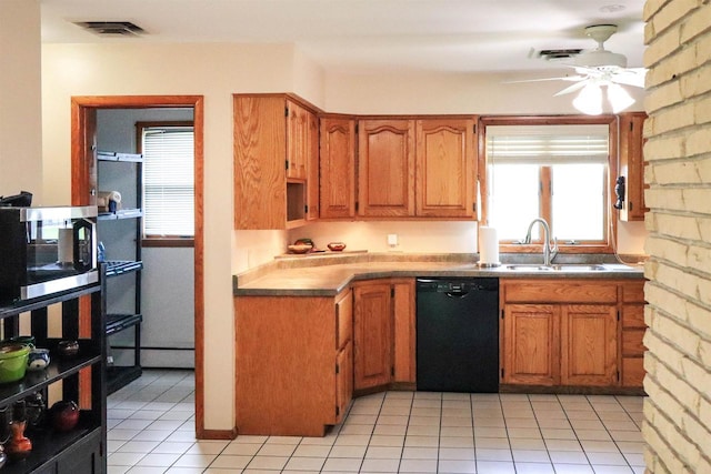 1007 Franklin St, Sauk City, WI 53583 - kitchen featuring dishwasher, a sink, stainless steel microwave, ceiling fan, and brown cabinets