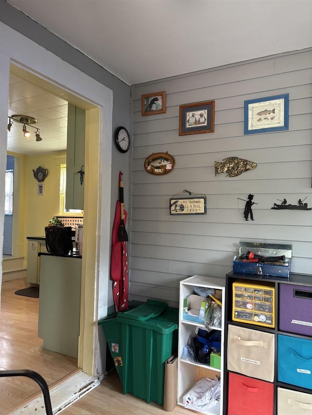 307 E Washington St, Crandon, WI 54520 - mudroom featuring light wood finished floors and wood walls