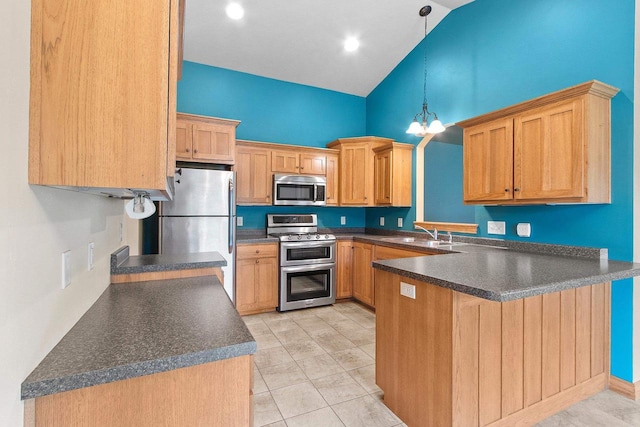 1126 Princess Dove Cir, De Pere, WI 54115 - kitchen featuring stainless steel appliances, a peninsula, dark countertops, lofted ceiling, and a sink