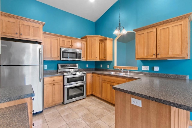 1126 Princess Dove Cir, De Pere, WI 54115 - kitchen with stainless steel appliances, a sink, dark countertops, high vaulted ceiling, and hanging light fixtures