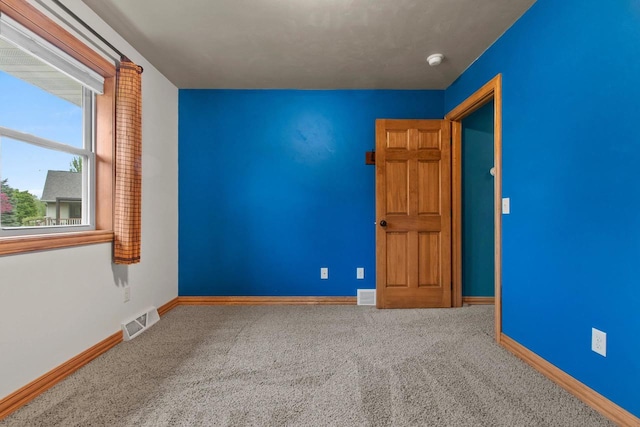1126 Princess Dove Cir, De Pere, WI 54115 - carpeted spare room featuring baseboards and a smoke detector
