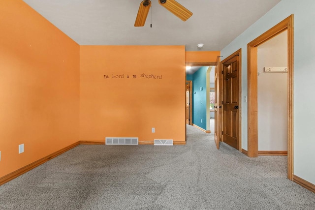 1126 Princess Dove Cir, De Pere, WI 54115 - carpeted empty room featuring a ceiling fan and baseboards