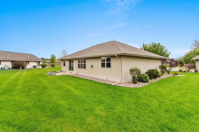 1126 Princess Dove Cir, De Pere, WI 54115 - rear view of property with a yard and a patio area