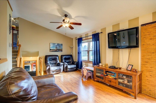 182 Ames St, Oregon, WI 53575 - living area featuring wood finished floors, lofted ceiling, and a ceiling fan