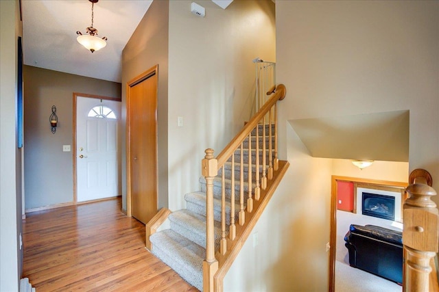 182 Ames St, Oregon, WI 53575 - entryway with wood finished floors and stairs